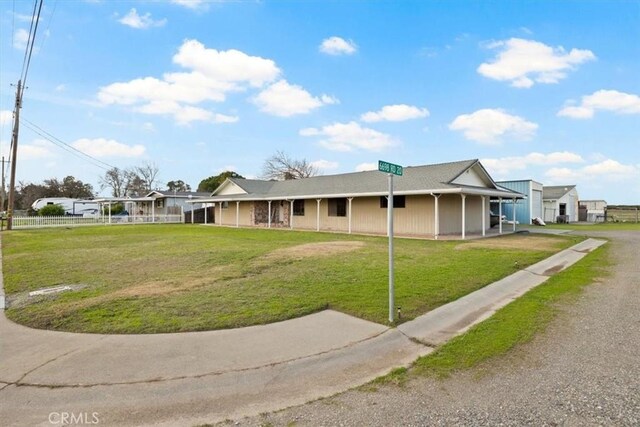 view of front of home with a front yard