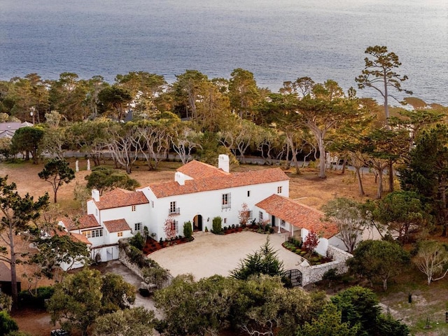 birds eye view of property featuring a water view