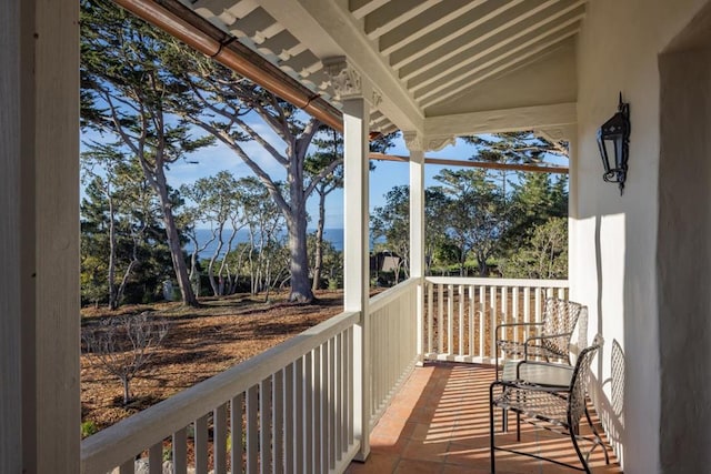 balcony featuring a porch