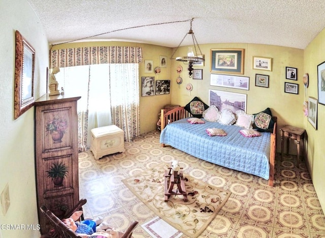 bedroom featuring brick ceiling, lofted ceiling, and a textured ceiling