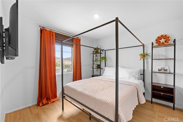 bedroom featuring light wood-type flooring