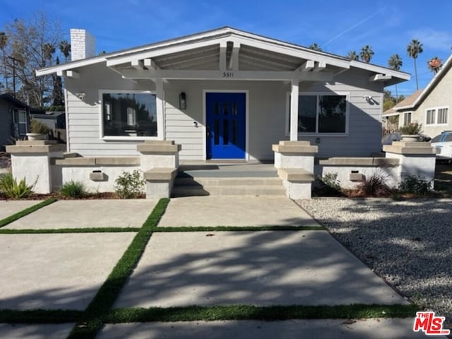 bungalow-style home with a porch