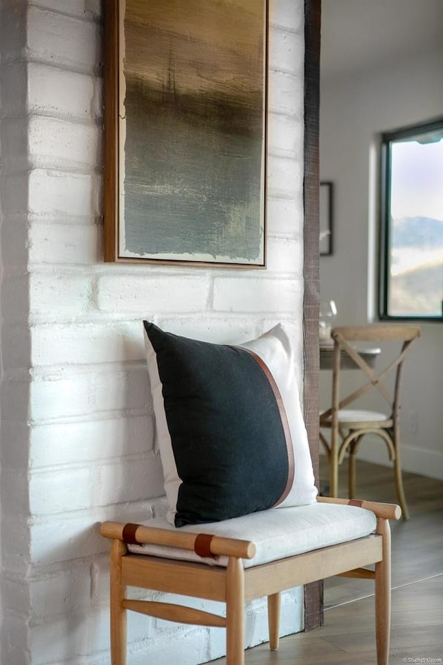 sitting room with hardwood / wood-style floors