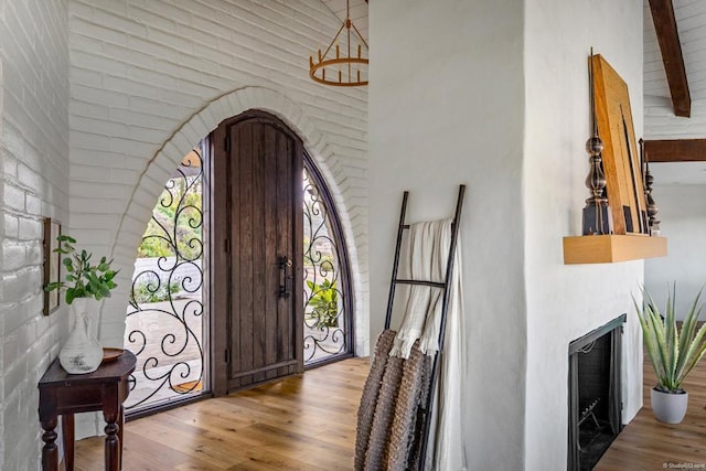 foyer entrance with hardwood / wood-style flooring