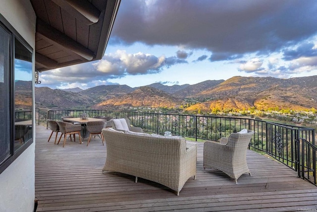 wooden terrace with a mountain view