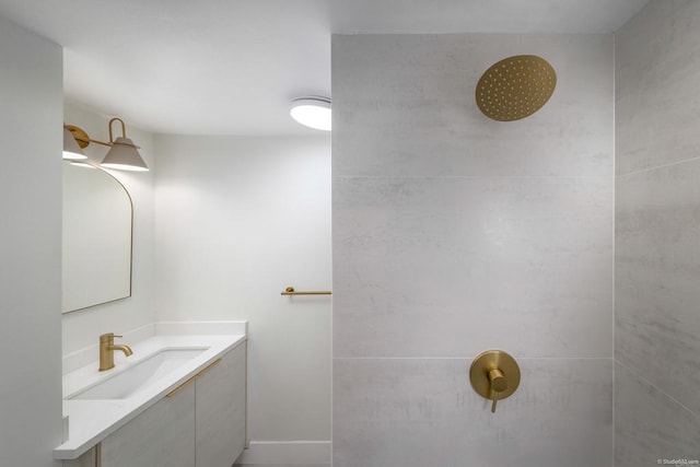 bathroom featuring vanity and walk in shower