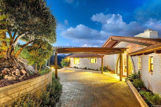 exterior space featuring a pergola