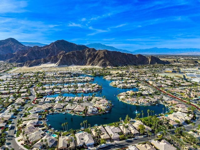 bird's eye view featuring a water and mountain view