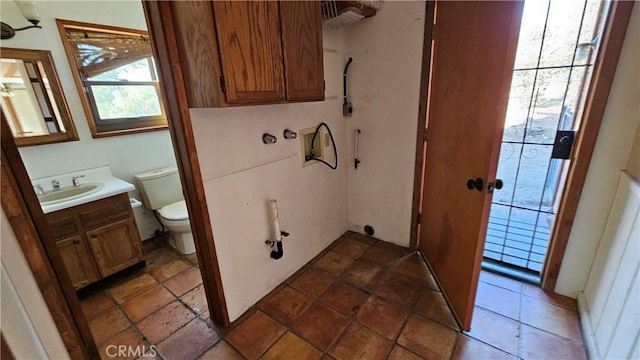 interior space featuring toilet and vanity