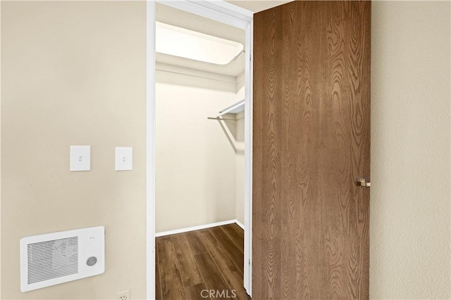 spacious closet with hardwood / wood-style floors