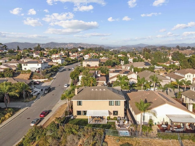 aerial view featuring a residential view and a mountain view