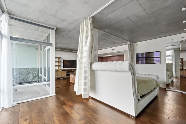 unfurnished bedroom featuring dark hardwood / wood-style floors