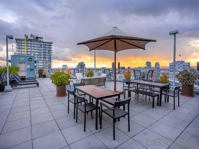 view of patio terrace at dusk