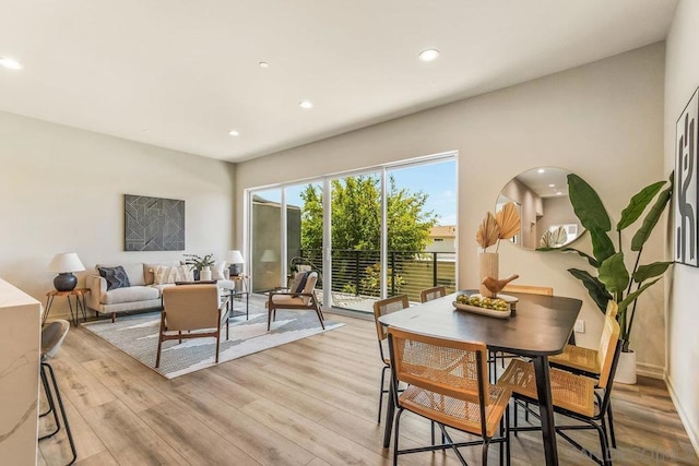 dining room featuring light wood-type flooring