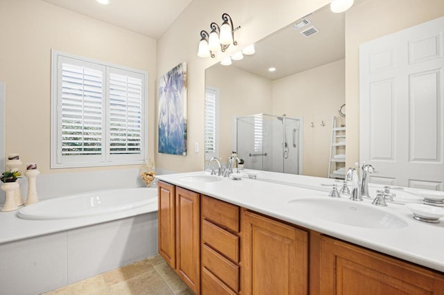 bathroom featuring independent shower and bath and vanity