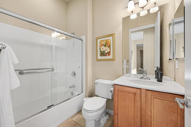 full bathroom with toilet, shower / bath combination with glass door, and vanity