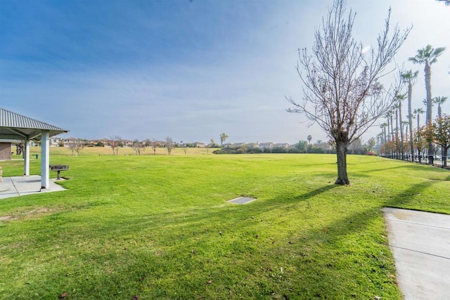 view of yard with a rural view