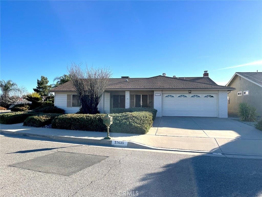 single story home with a garage