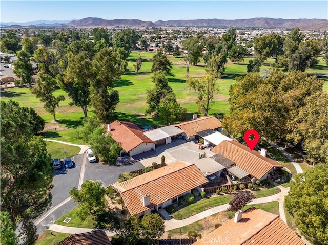 birds eye view of property featuring a mountain view and golf course view