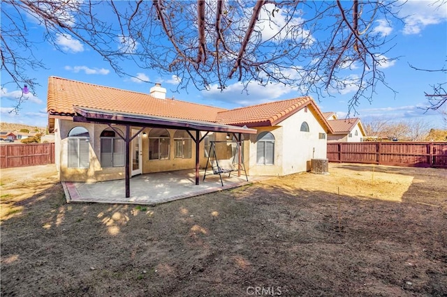 back of house featuring a patio