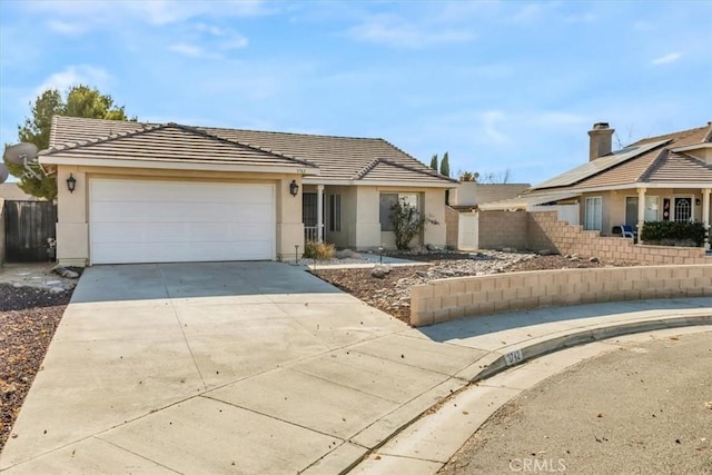 ranch-style home featuring a garage