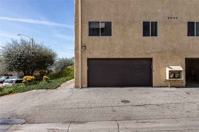 exterior space featuring a garage