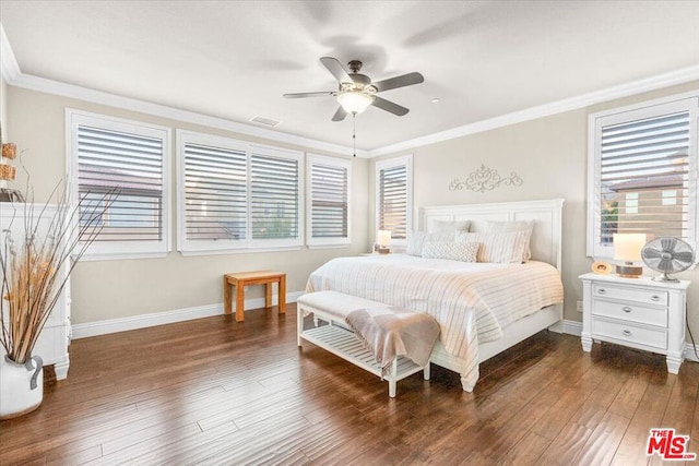 bedroom featuring ceiling fan, dark hardwood / wood-style flooring, and crown molding