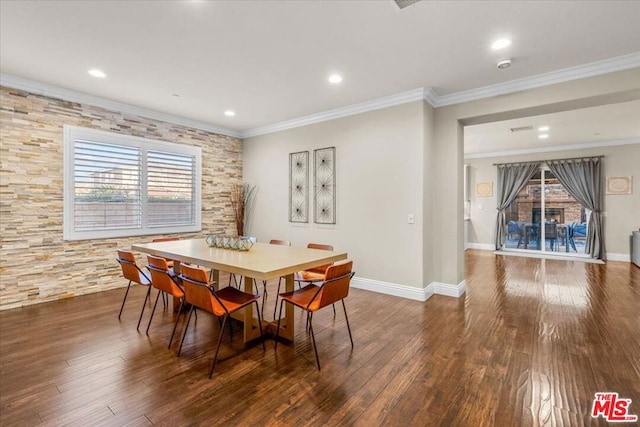 dining area featuring dark hardwood / wood-style flooring and ornamental molding