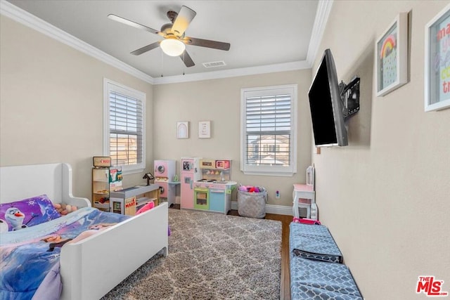 bedroom featuring ceiling fan, hardwood / wood-style flooring, and ornamental molding