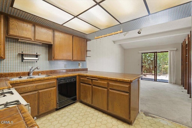 kitchen featuring light colored carpet, kitchen peninsula, decorative backsplash, sink, and black dishwasher