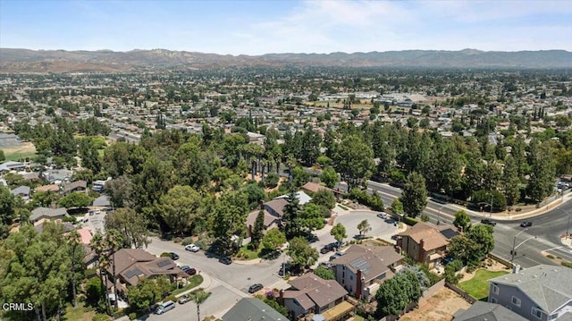 drone / aerial view featuring a mountain view