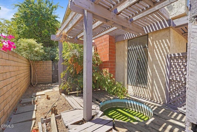 view of patio / terrace featuring a pergola