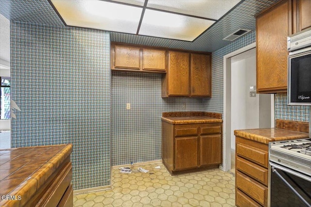 kitchen featuring white stove