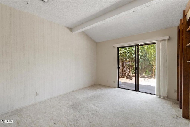 carpeted spare room with lofted ceiling with beams