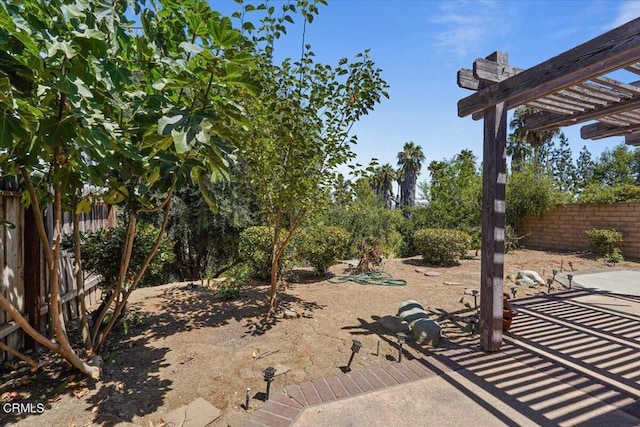 view of yard with a pergola