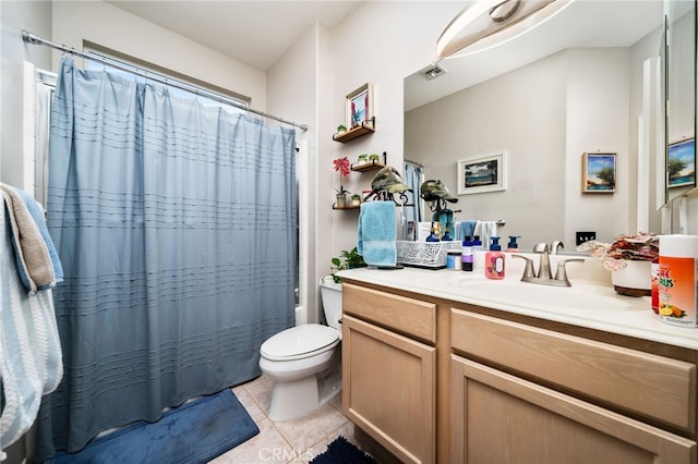 full bathroom with vanity, shower / tub combo, tile patterned floors, and toilet