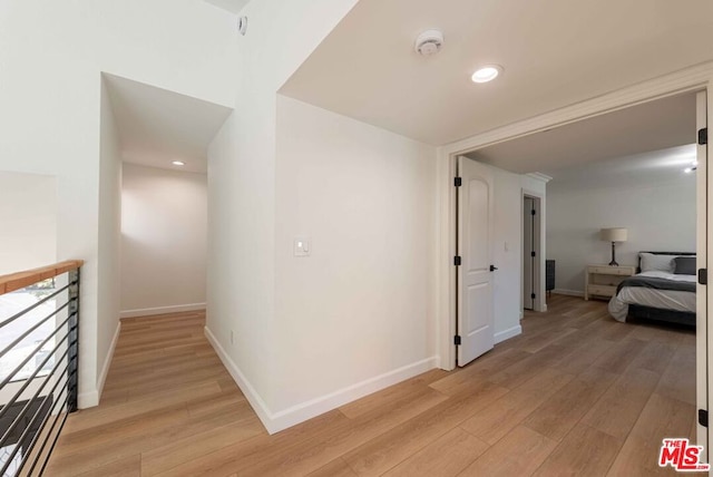 hallway featuring light wood-type flooring