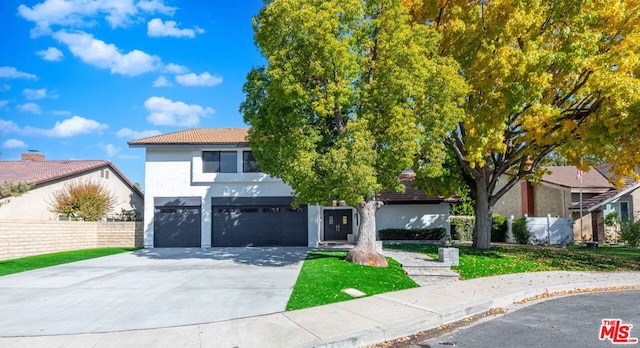 view of front of property featuring a garage