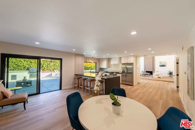 dining room featuring light hardwood / wood-style floors