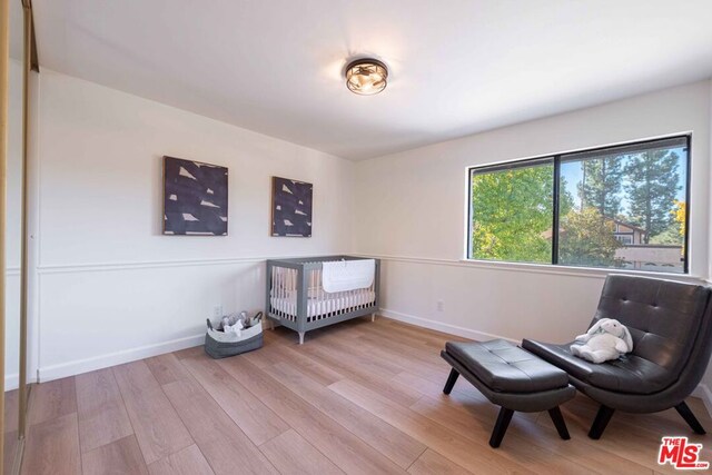 living area featuring light hardwood / wood-style floors