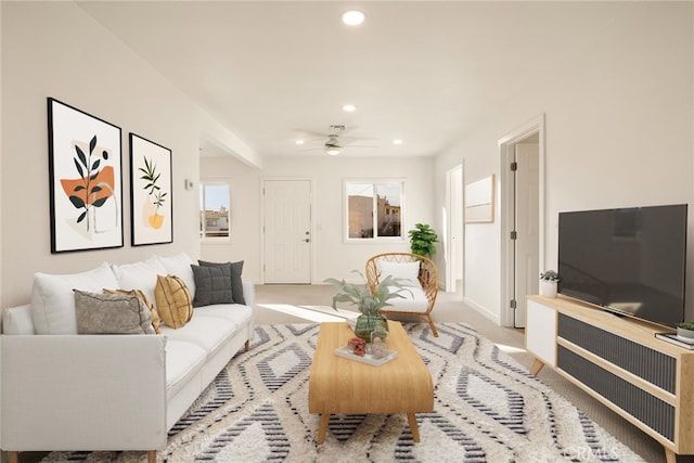 living room featuring ceiling fan and light carpet