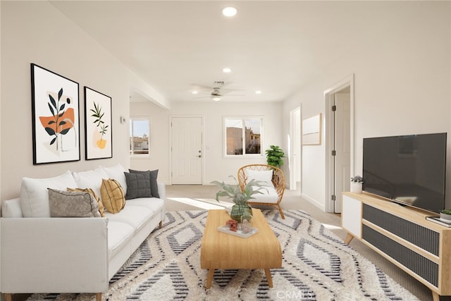 carpeted living room with baseboards, a ceiling fan, and recessed lighting