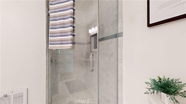 bathroom with an enclosed shower