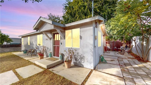 view of front of home featuring a patio area