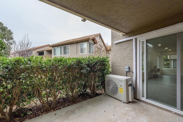 view of patio with ac unit