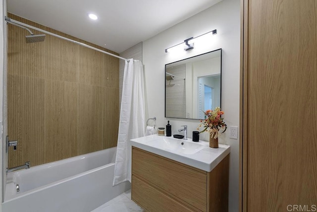 bathroom with vanity and shower / bath combination with curtain