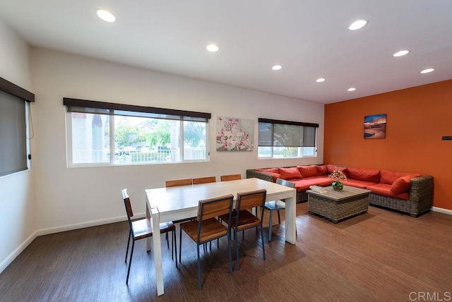 dining area featuring recessed lighting, wood finished floors, and baseboards