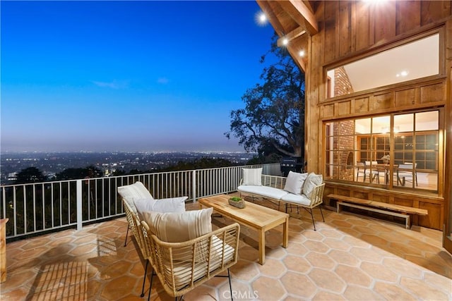 patio terrace at dusk with an outdoor hangout area