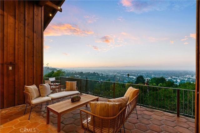 view of balcony at dusk