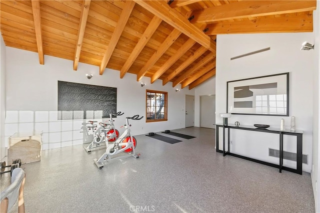 workout area with wooden ceiling and high vaulted ceiling